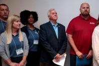 United Auto Workers (UAW) Vice President Terry Dittes and National Bargaining Committee Chair Ted Krumm wait to address the media about the general strike against General Motors in Detroit