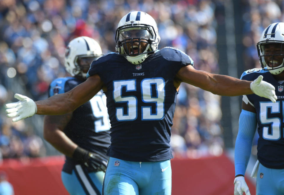 Nov 5, 2017; Nashville, TN, USA; Tennessee Titans linebacker Wesley Woodyard (59) celebrates after a defensive stop during the first half against the Baltimore Ravens at Nissan Stadium. Mandatory Credit: Christopher Hanewinckel-USA TODAY Sports