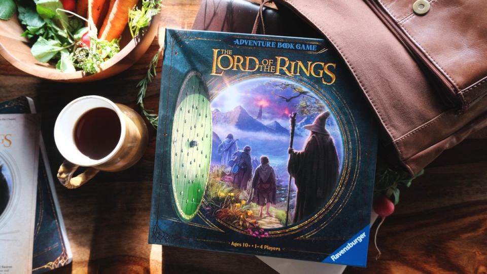 The Lord of the Rings Adventure Book box art on a table