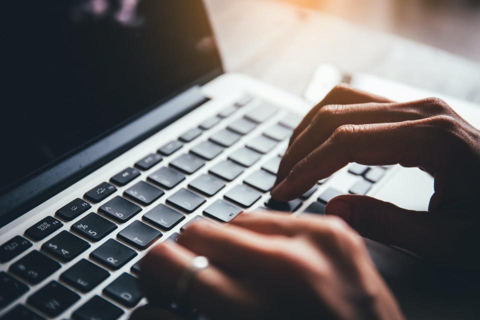 Hands at a keyboard