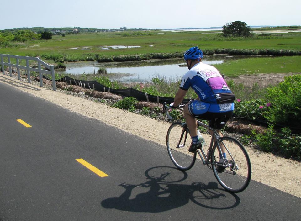 Biking along the Shining Sea Bikeway in Falmouth.