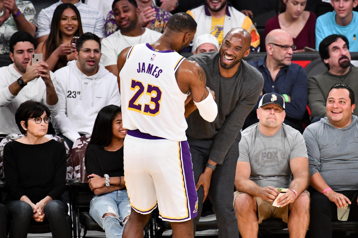 Kobe Bryant had some fun at Staples Center on Sunday. (Photo by Allen Berezovsky/Getty Images)