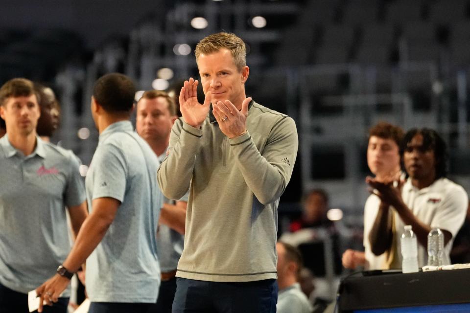 Mar 16, 2024; Fort Worth, TX, USA; Florida Atlantic Owls head coach Dusty May reacts after a play against the Temple Owls during the first half at Dickies Arena. Mandatory Credit: Chris Jones-USA TODAY Sports