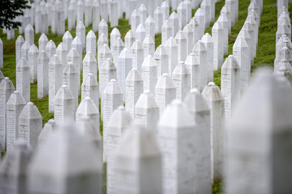 Gravestones are lined up at the memorial cemetery in Potocari, near Srebrenica, Bosnia, Tuesday, July 7, 2020. A quarter of a century after they were killed in Sreberenica, eight Bosnian men and boys will be laid to rest Saturday, July 11. Over 8,000 Bosnian Muslims perished in 10 days of slaughter after the town was overrun by Bosnian Serb forces in the closing months of the country’s 1992-95 fratricidal war. (AP Photo/Kemal Softic)