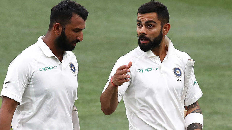 Virat Kohli and Cheteshwar Pujara. (Photo by Ryan Pierse/Getty Images)