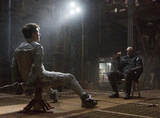 This film publicity image released by Universal Pictures shows Tom Cruise, left, and Morgan Freeman in a scene from "Oblivion." (AP Photo/Universal Pictures)