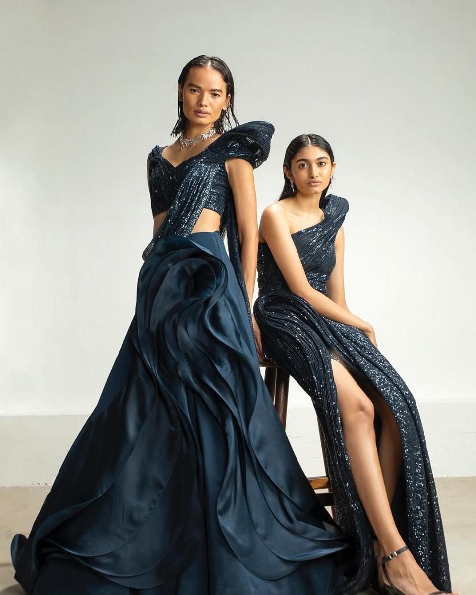 Shimmers, sheer fabrics, 3D floral applique, intricate hand embroideries engineered with pearls and metallic sequins make up Gaurav Gupta's collection/