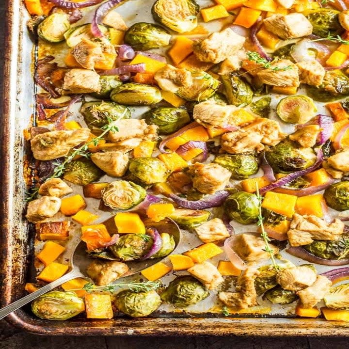 Brussels sprouts,  butternut squash, and chicken on a sheet pan.
