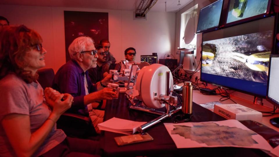 <div class="inline-image__caption"><p>Oussama Khatib and his team navigating the robot and looking at its observations. </p></div> <div class="inline-image__credit">Frederic Osada/DRASSM/Stanford</div>