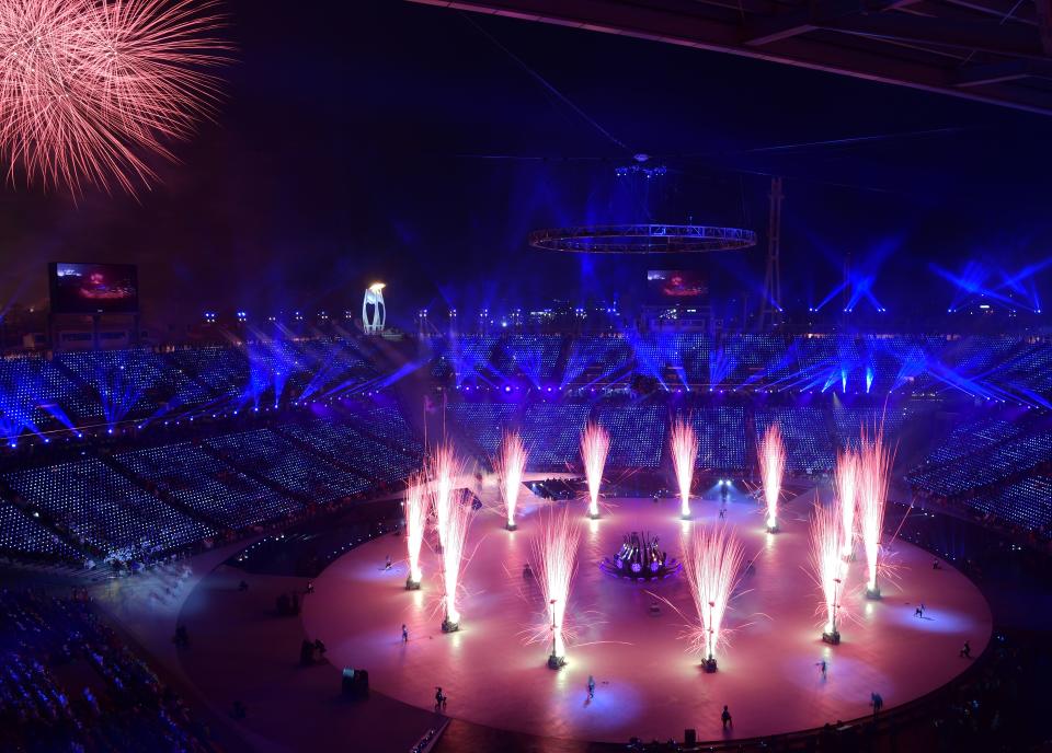 <p>Fireworks go off as the Olympic Flame is lit during the opening ceremony of the Pyeongchang 2018 Winter Olympic Games at the Pyeongchang Stadium on February 9, 2018. / AFP PHOTO / JAVIER SORIANO </p>