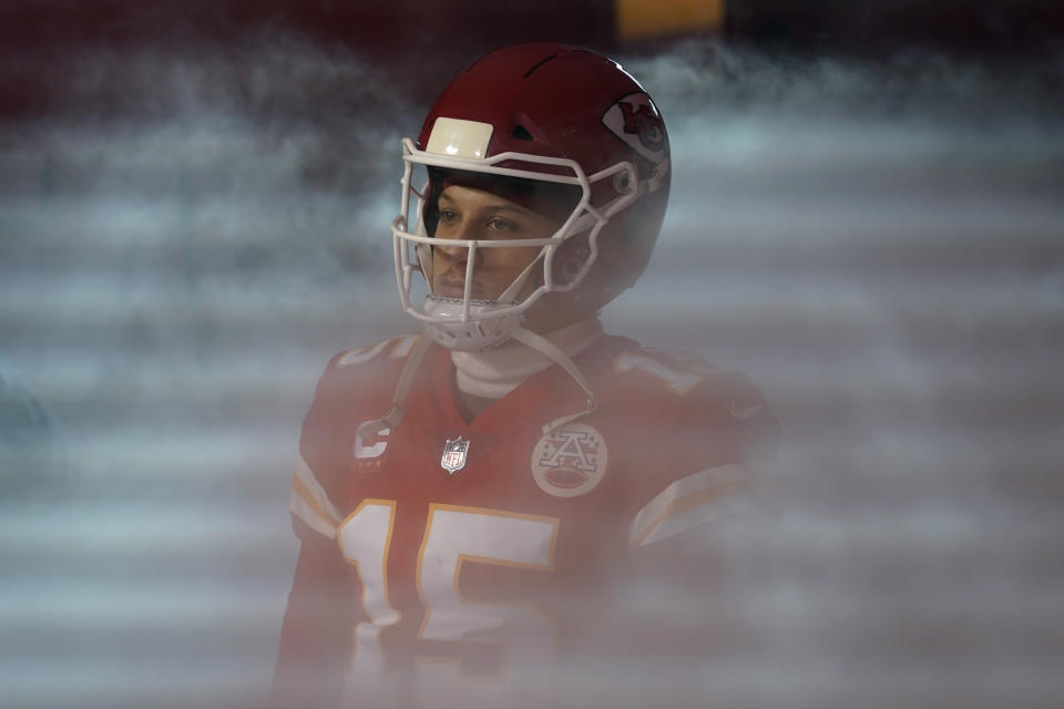 Kansas City Chiefs quarterback Patrick Mahomes waits to run on the field before an NFL divisional round playoff football game against the Buffalo Bills, Sunday, Jan. 23, 2022, in Kansas City, Mo. (AP Photo/Ed Zurga)