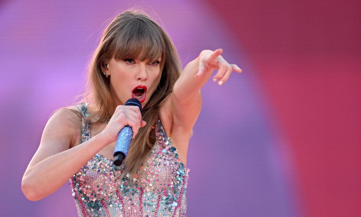 <span>Taylor Swift performs during the first night of the Eras tour in Australia in February.</span><span>Photograph: Joel Carrett/AAP</span>