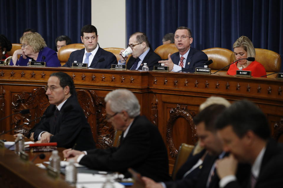 House Judiciary Committee ranking member Rep. Doug Collins, R-Ga., right, gives his opening statement during a House Judiciary Committee markup of the articles of impeachment against President Donald Trump, Wednesday, Dec. 11, 2019, on Capitol Hill in Washington. House Judiciary Committee Chairman Rep. Jerrold Nadler, D-N.Y., is left. (AP Photo/Patrick Semansky)