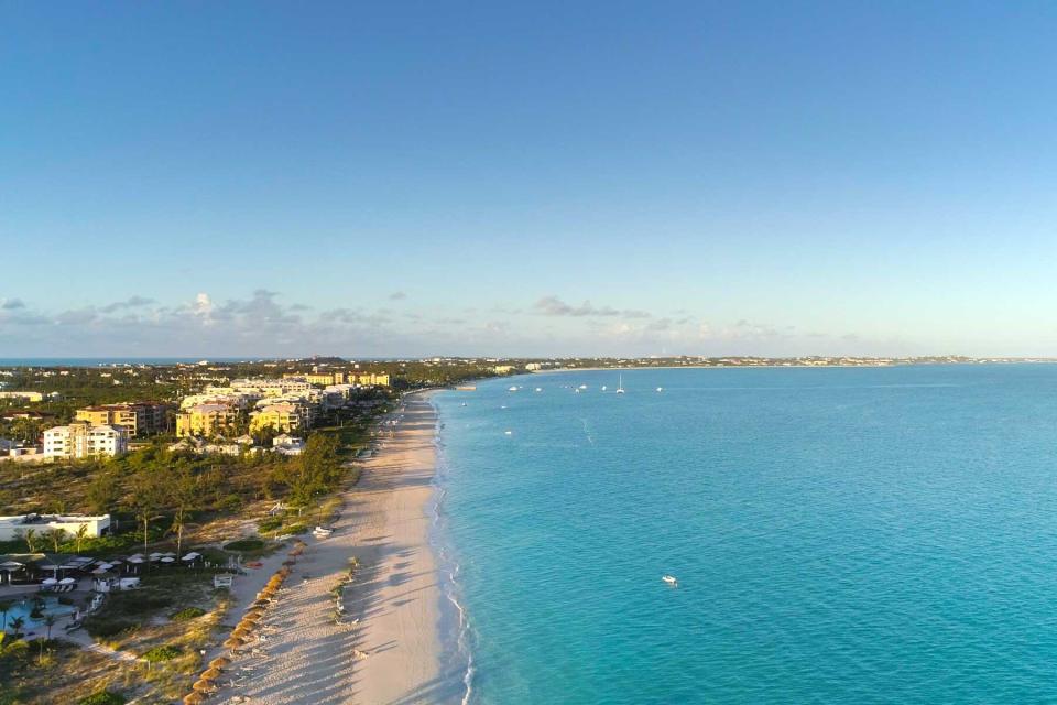 Drone Aerial view of famous Grace Bay at dawn 300 ft up