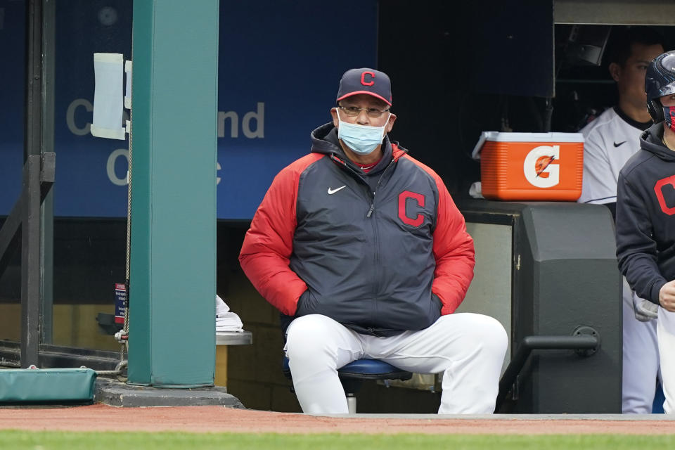 FILE - In this Monday, April 5, 2021 file photo, Cleveland Indians manager Terry Francona watches in the fourth inning of a baseball game against the Kansas City Royals in Cleveland. Indians manager Terry Francona is confident he'll return next season after missing most of the past two because of serious health issues. Francona was forced to step away from the club in late July to undergo surgeries on his hip and big toe.(AP Photo/Tony Dejak, File)