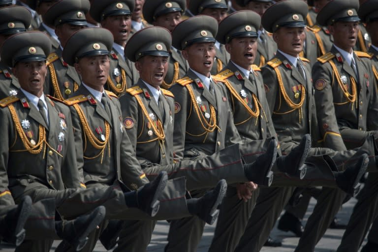 Ggoose-stepping soldiers pour into Kim Il-Sung Square, in Pyongyang on April 15, 2017