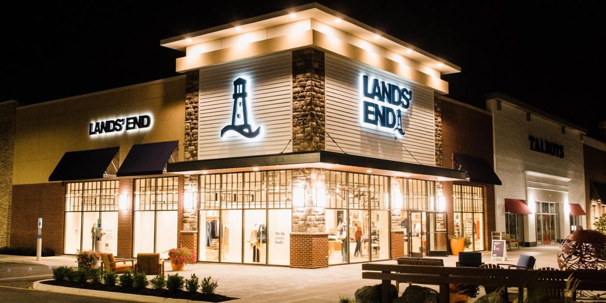 A storefront for a Lands' End retail location at night