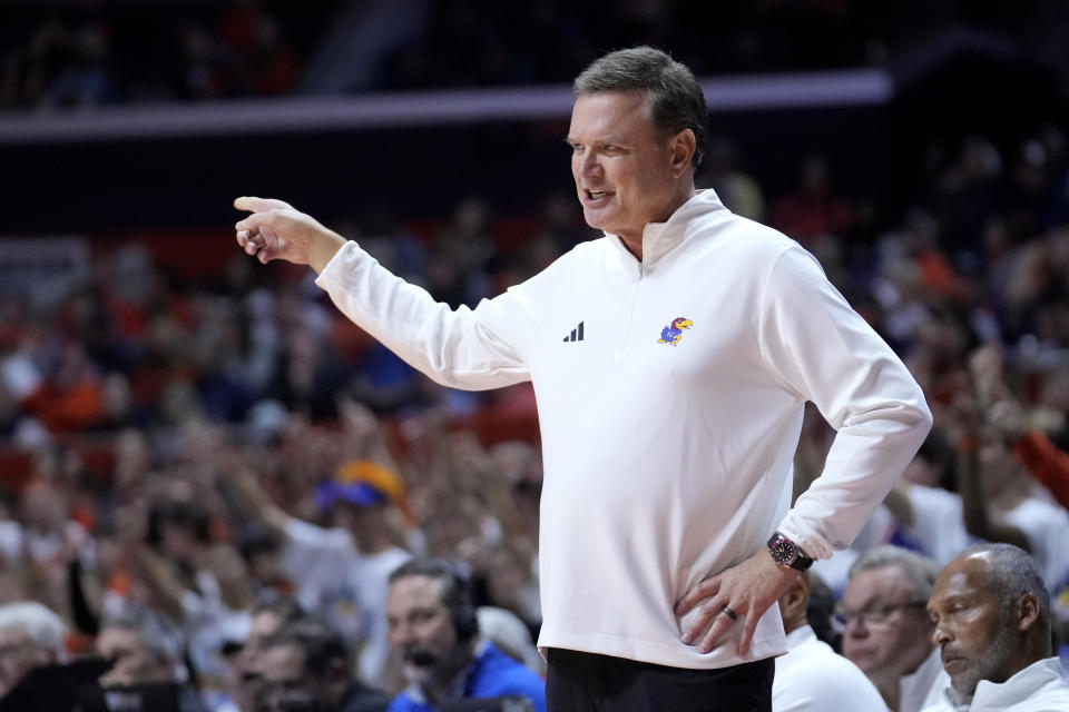 Kansas head coach Bill Self directs his team during the first half of the NCAA college basketball exhibition game against Illinois Sunday, Oct. 29, 2023, in Champaign, Ill. (AP Photo/Charles Rex Arbogast)