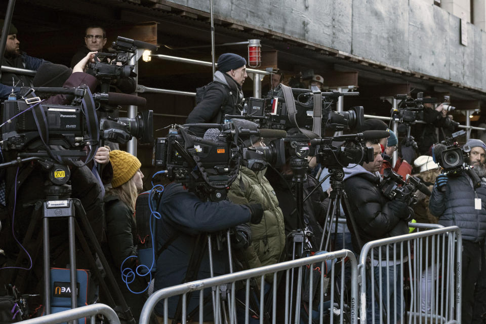 Members of the press wait for Manhattan District Attorney Alvin Bragg to leave the District Attorney's office in New York, Thursday, March. 30, 2023. (AP Photo/Yuki Iwamura)