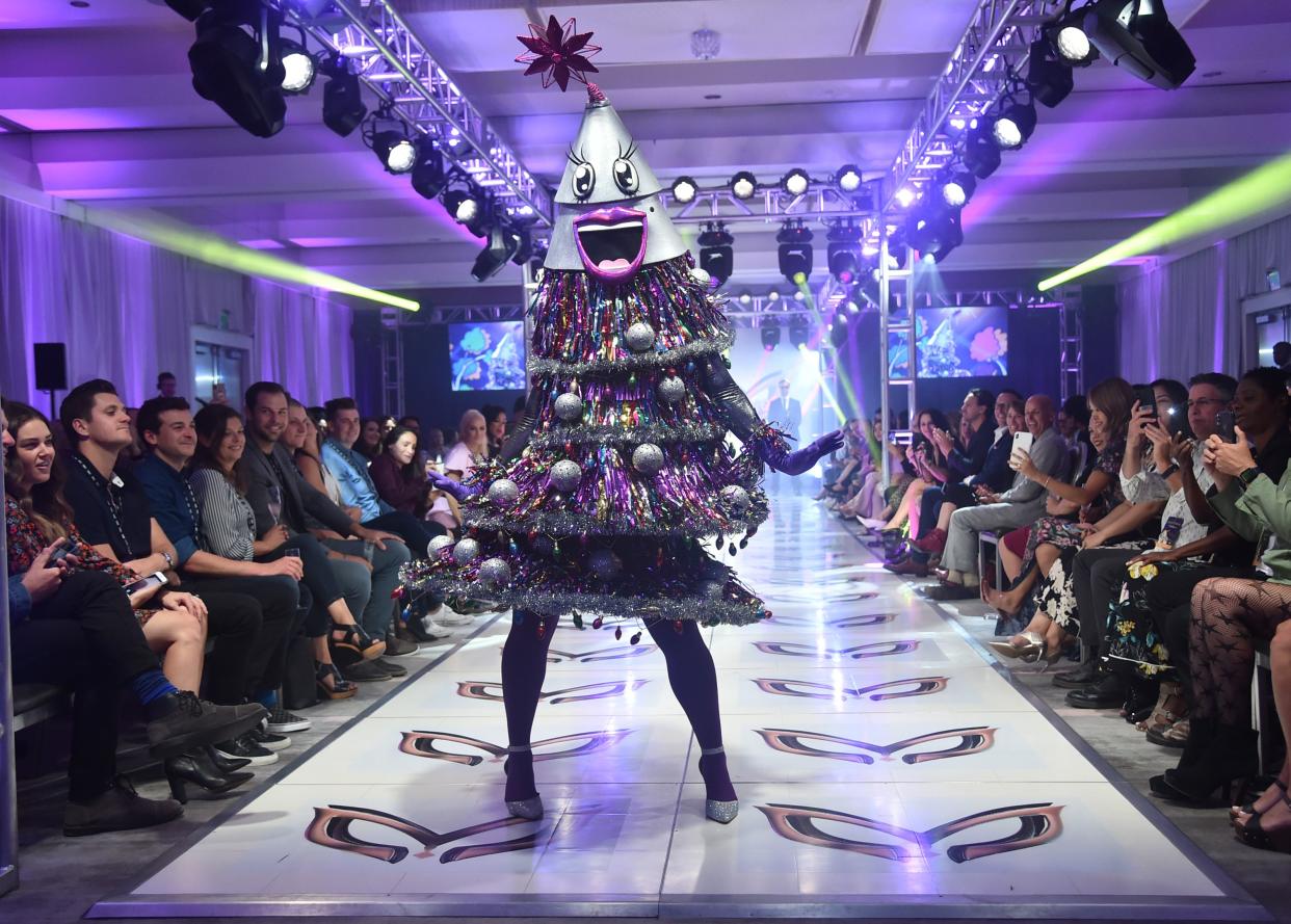 The Tree from The Masked poses at the end of the runway