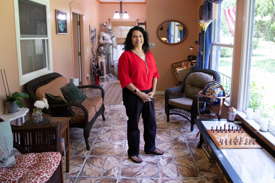 Little English Guesthouse Bed and Breakfast Owner Tracey Cochran stands inside the business's front room Sunday, August 10, 2021. 