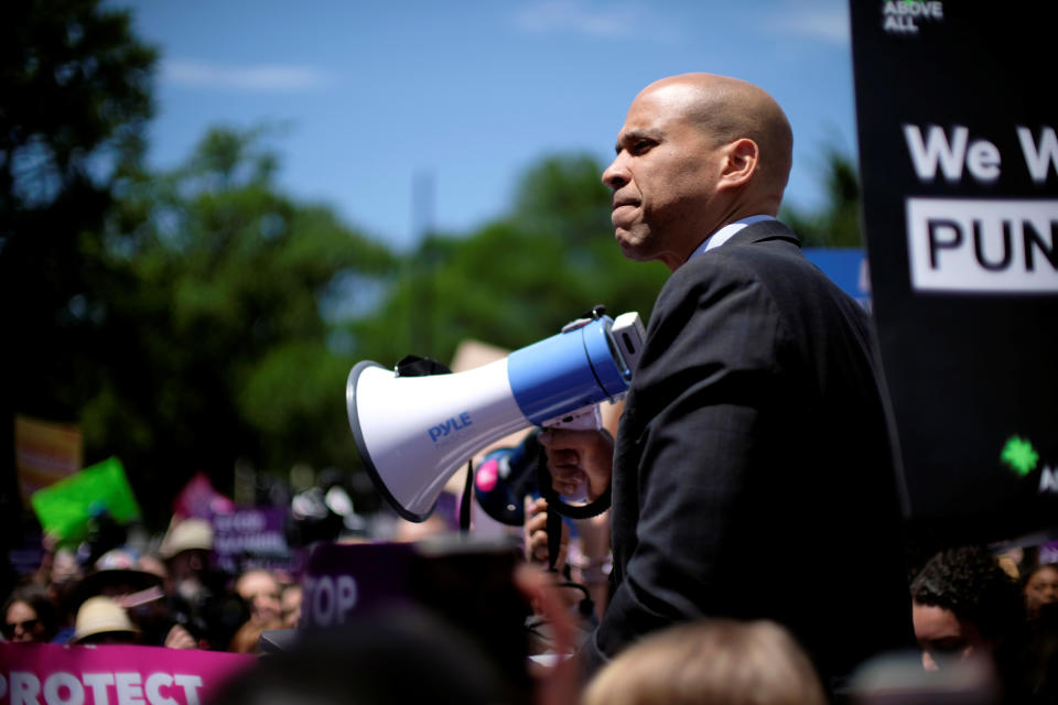 Sen. Cory Booker, D-N.J., during a protest at the Supreme Court against anti-abortion legislation, May 21. (Photo: James Lawler Duggan/Reuters)