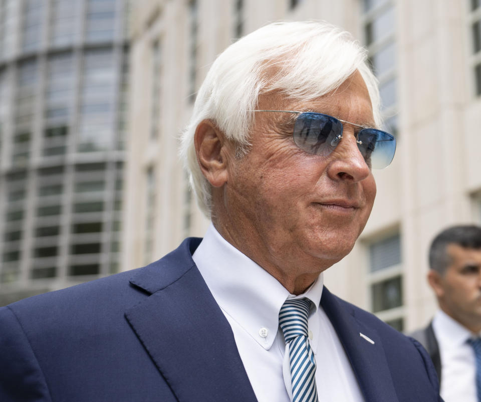 FILE - Horse trainer Bob Baffert leaves federal court July 12, 2021, in the Brooklyn borough of New York. Churchill Downs is extending Baffert's suspension through 2024. Churchill Downs Incorporated announced Monday, July 3, 2023, it was continuing Baffert's ban citing continued concerns regarding the threat to the safety and integrity of racing he poses to CDI-owned racetracks. (AP Photo/John Minchillo, File)