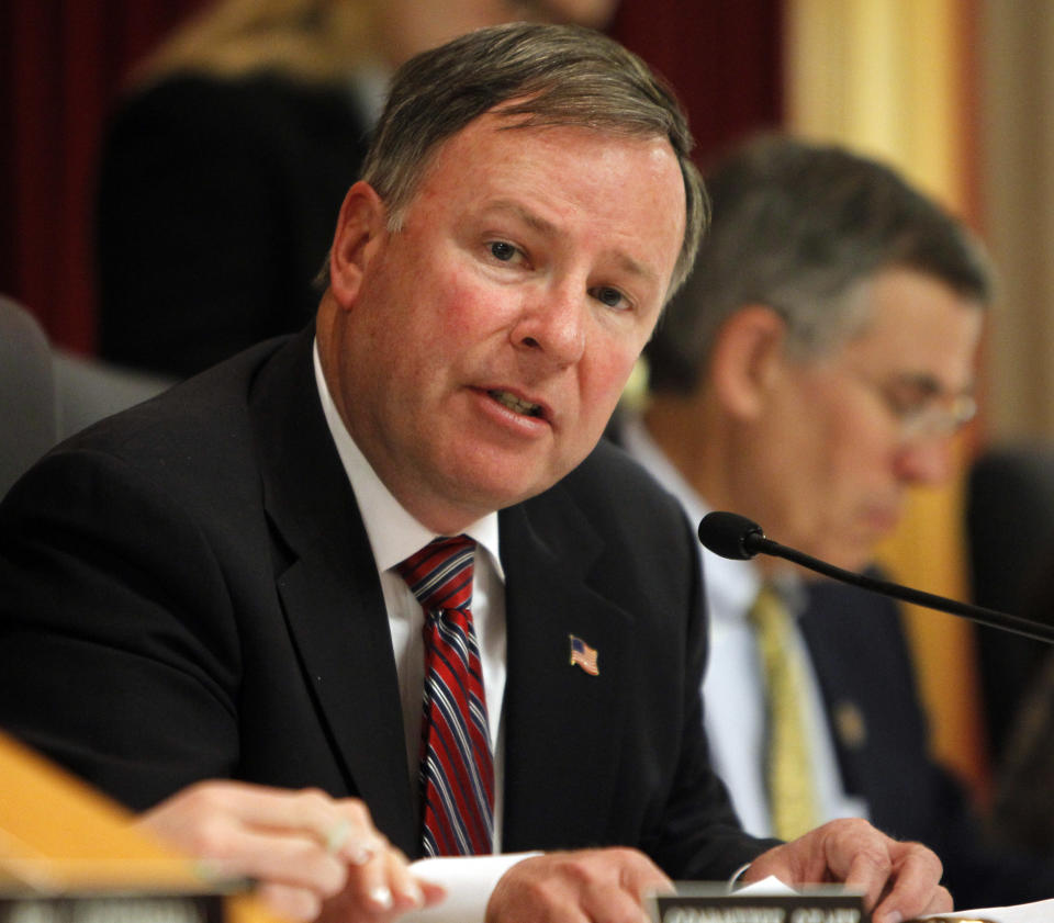 Rep. Doug Lamborn, R-Colo., the chair of a field hearing by the Subcommittee on Energy and Mineral Resources speaks as the subcommittee hears witnesses on proposed nationwide drilling rules on hydraulic fracturing at the Capitol in Denver on Wednesday, May 2, 2012. (AP Photo/Ed Andrieski)