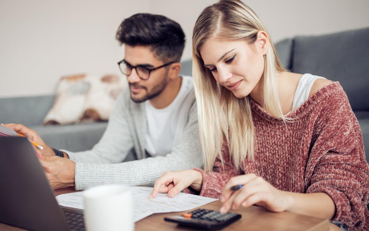 Couple calculating their finances