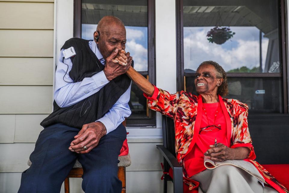 Loretta and Percy Howell, who've been married since 1956, share a moment of affection at their home in Buffalo.