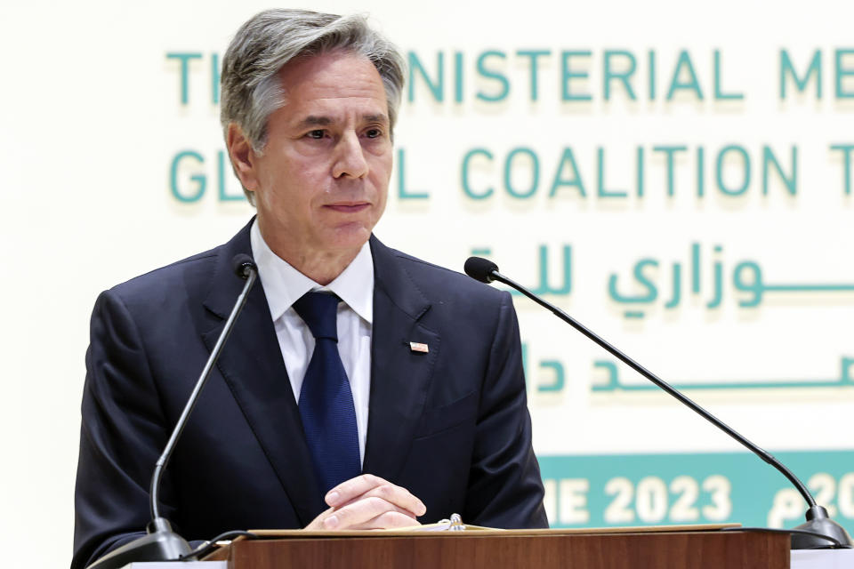 Secretary of State Antony Blinken listens as he attends a joint news conference with Saudi Arabia's Foreign Minister Prince Faisal bin Farhan, not pictured, at the Intercontinental Hotel in Riyadh, Saudi Arabia, Thursday, June 8, 2023. (Ahmed Yosri/Pool Photo via AP)