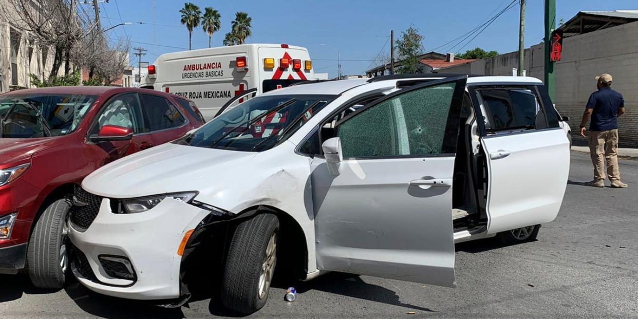 The white van driven by a group of Americans across the border is riddled with bullet holes after they were attacked.