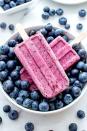 <p>It's easy to beat the heat with these healthy popsicles that are packed with three wholesome ingredients: coconut milk, blueberries, and maple syrup.</p><p><strong>Get the recipe at <a rel="nofollow noopener" href="https://beamingbaker.com/vegan-blueberry-coconut-popsicles-gluten-free-dairy-free/" target="_blank" data-ylk="slk:Beaming Baker.;elm:context_link;itc:0;sec:content-canvas" class="link ">Beaming Baker.</a></strong></p>