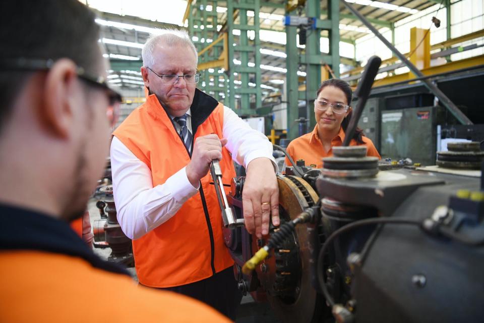 <span class="caption">On the job: Scott Morrison has long had a good understanding of the ‘theatre’ of politics.</span> <span class="attribution"><span class="source">Dean Lewins/AAP</span></span>