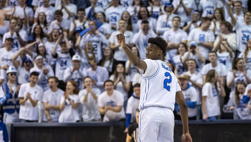 BYU guard Jaxson Robinson (2) calls to teammates after making a basket against Kansas State during the first half of an NCAA college basketball game Saturday, Feb. 10, 2024, in Provo, Utah. (AP Photo/Isaac Hale)