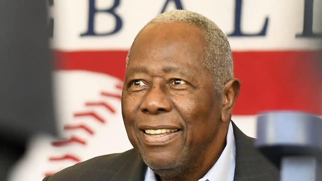 National Baseball Hall of Famer Hank Aaron arrives for an induction ceremony in 2017.