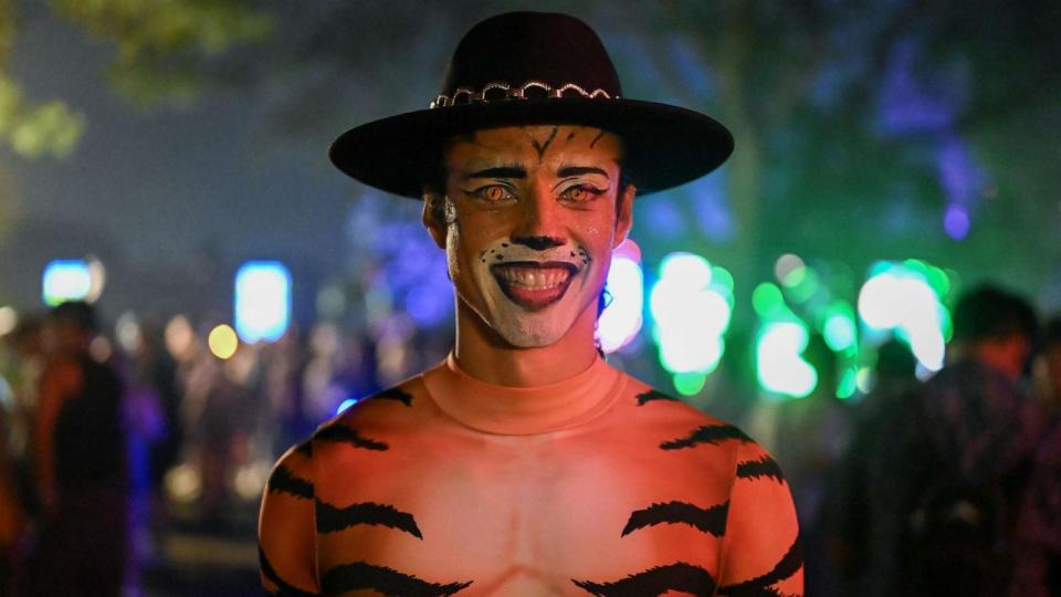 PHOTO: A man with costume attends the second day of the Electric Zoo Festival at Randall's Island in New York City, Sept. 3, 2023. (Anadolu Agency via Getty Images)