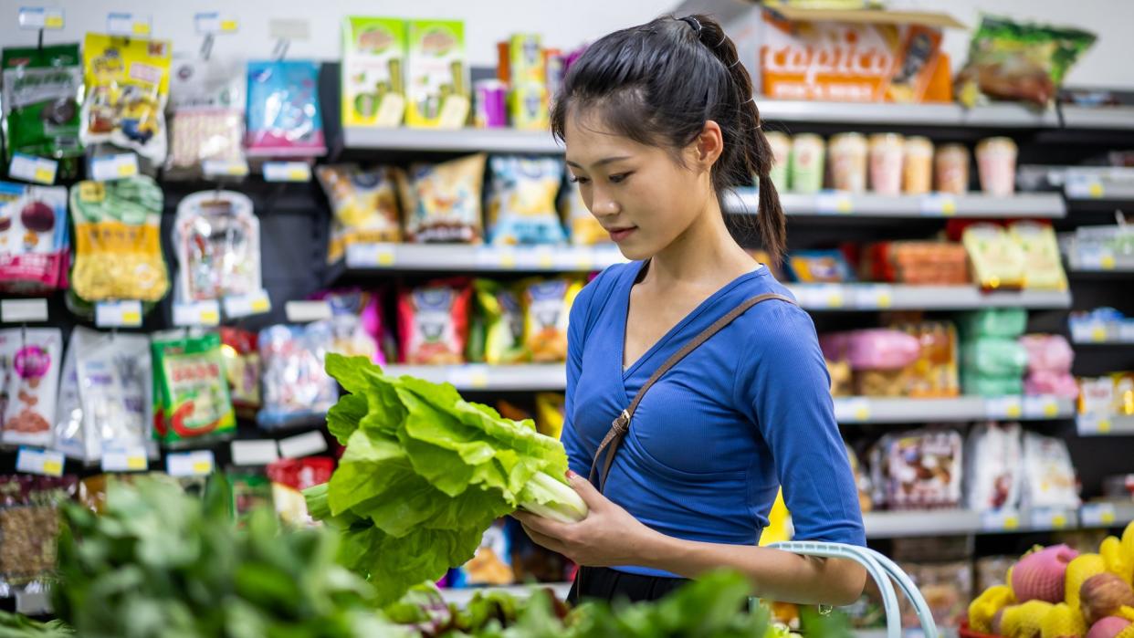 Woman shopping for vegetables. (iStock.com)