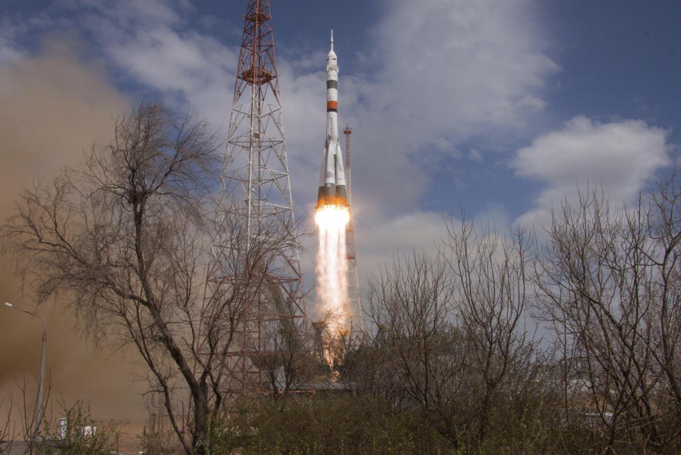 In this handout photo released by Roscosmos Space Agency Press Service the Soyuz-2.1A rocket booster with Soyuz MS-16 space ship carrying a new crew to the International Space Station, ISS, blasts off at the Russian leased Baikonur cosmodrome, Kazakhstan, Thursday, April 9, 2020. The Russian rocket carries U.S. astronaut Chris Cassidy, Russian cosmonauts Anatoly Ivanishin and Ivan Vagner. (Roscosmos Space Agency Press Service via AP)