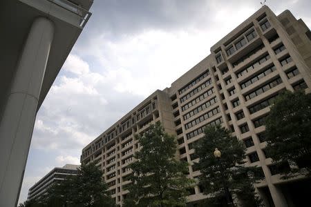 An exterior view of the International Monetary Fund (IMF) headquarters is seen in Washington July 1, 2015. . REUTERS/Jonathan Ernst