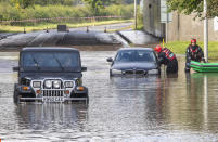 In Kirkliston, West Lothian, emergency services had to rescue drivers from floodwater. (SWNS)