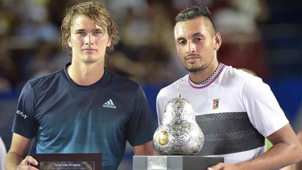 Alexander Zverev (pictured left) posing with the winner Nick Kyrgios (pictured right) after his win.