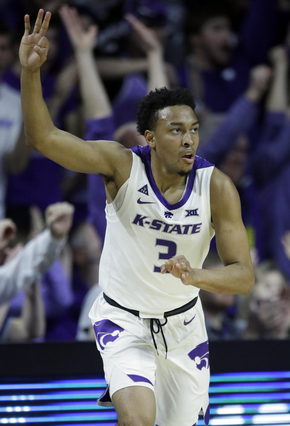Kansas State guard Kamau Stokes (3) celebrates a three-point basket during the first half of an NCAA college basketball game against Oklahoma in Manhattan, Kan., Saturday, March 9, 2019. (AP Photo/Orlin Wagner)