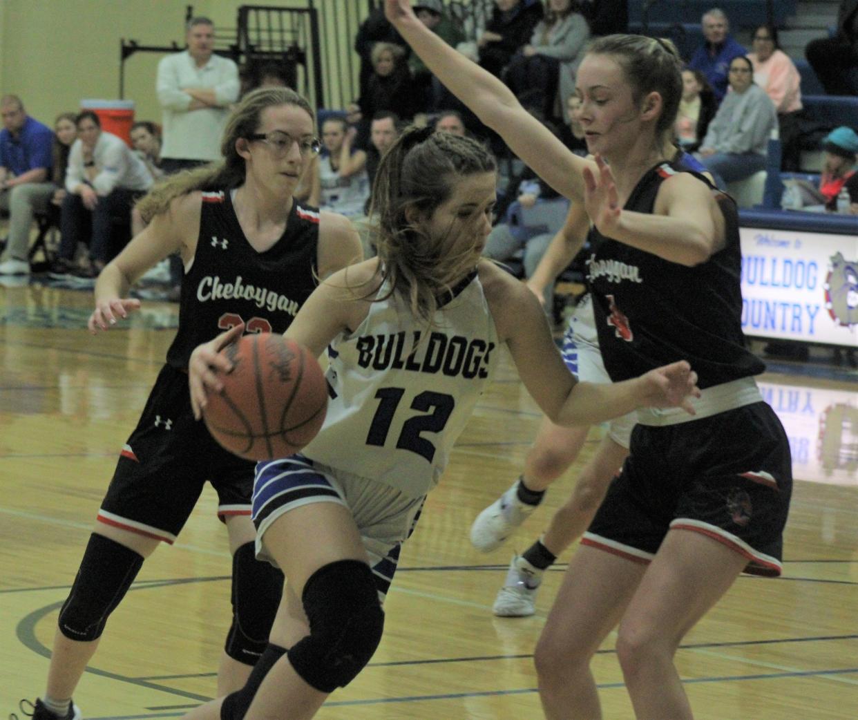 Chloe Robinson (12) and the Inland Lakes girls beat JoBurg on the road Wednesday.