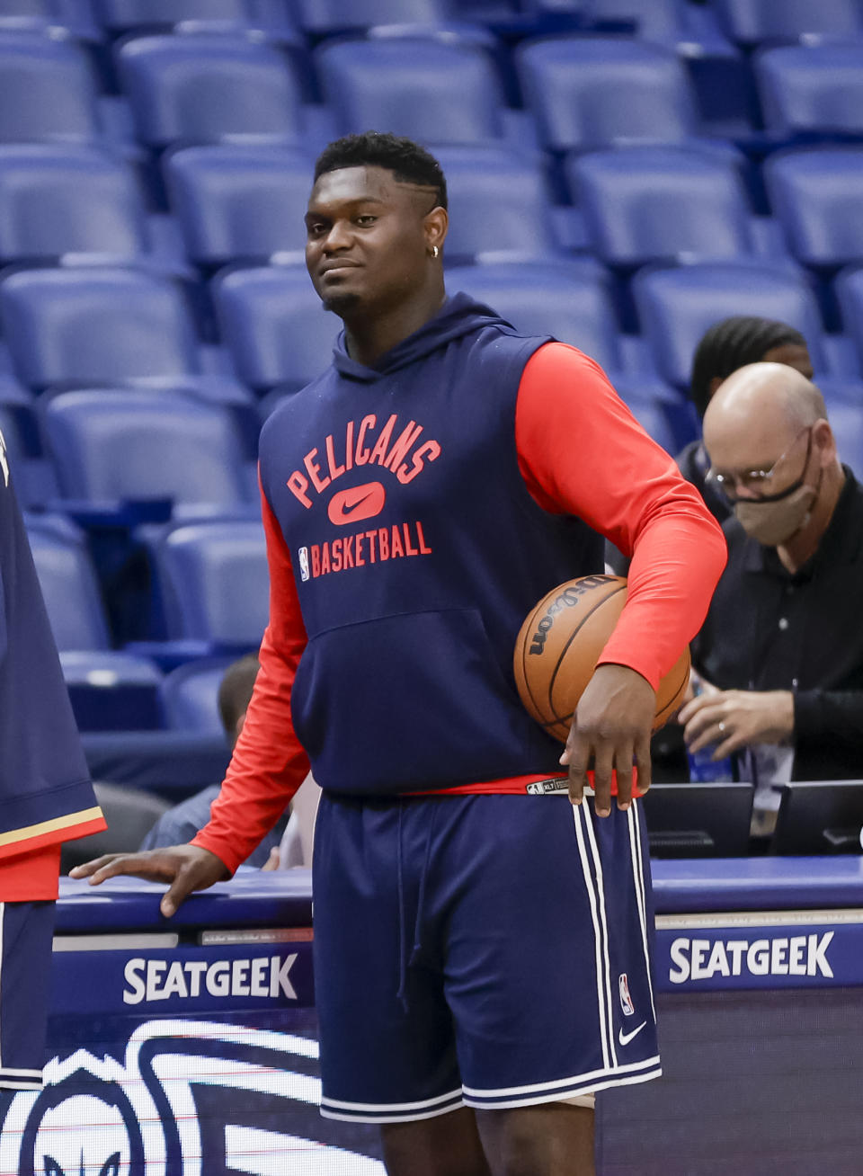 New Orleans Pelicans forward Zion Williamson (1) stands out on the court during warm ups before the tip off of an NBA basketball game against the New York Knicks in New Orleans, Saturday, Oct. 30, 2021. (AP Photo/Derick Hingle)