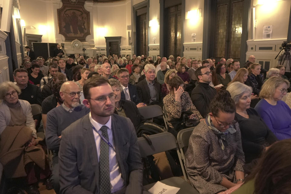 A couple of hundred people filled one of a meeting halls for a meeting with Paris officials at a Paris townhall, Thursday, Feb.8, 2024. Officials spent more than two hours explaining the security, traffic and other arrangements that will be in place and took questions. Paris officials, Games organizers and government ministries are in the midst of concerted campaigns to explain to Parisians how the July 26-Aug.11 Summer Olympics and Paralympics that follow will impact their lives and how they can adapt. (AP Photo/John Leicester)