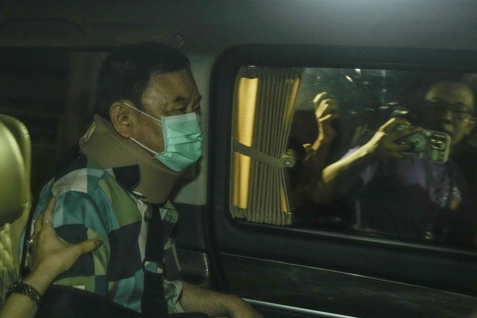 FILE - Former Thai Prime Minister Thaksin Shinawatra, sitting in a vehicle, leaves after being released from Police General Hospital on parole in Bangkok, Thailand, Sunday, Feb. 18, 2024. Thaksin, the Southeast Asian nation’s most controversial politician for more than two decades, was released on parole early Sunday from a Bangkok hospital where he spent six months serving time for corruption-related offenses. (AP Photo/Sakchai Lalit)