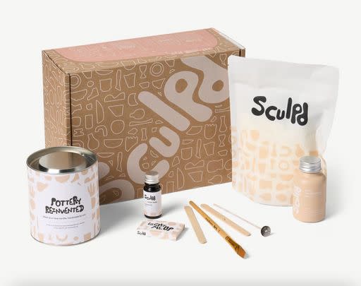 This crafty candle and clay vase kit