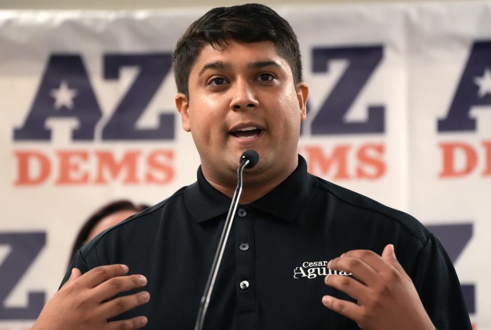 Cesar Aguilar, House of Representatives candidate for district 26, speaks at an Arizona Democratic Party Unity Rally with statewide candidates to energize Democratic voters and volunteers ahead of the November election at Carpenters Union Hall on Saturday, Aug. 27, 2022.  
