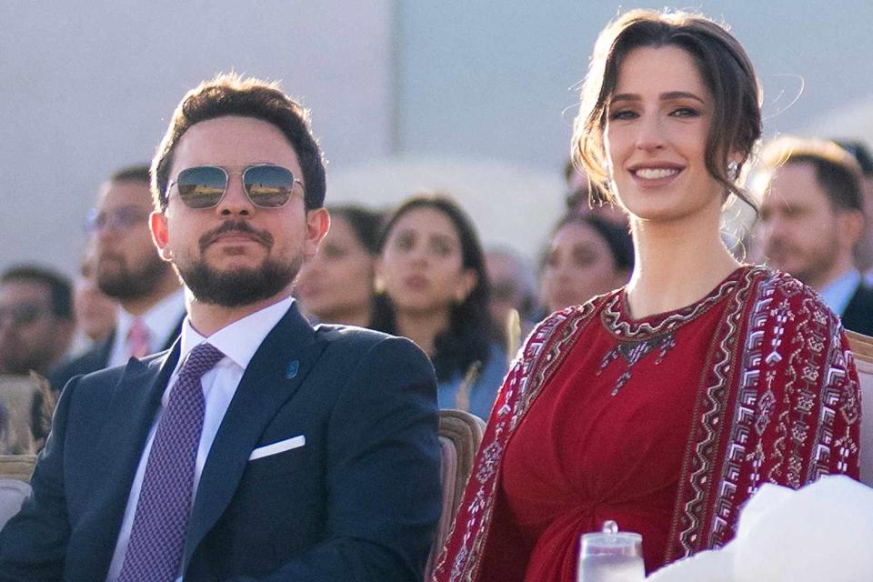 <p>Balkis Press/ABACA/Shutterstock</p> Crown Prince Hussein of Jordan and Princess Rajwa at the national event commemorating King Abdullah